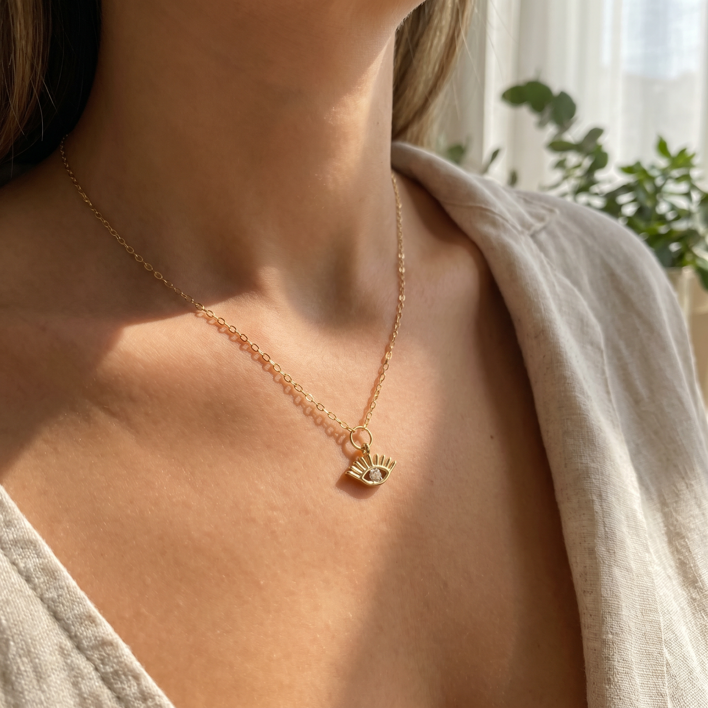 GOLD EVIL EYE